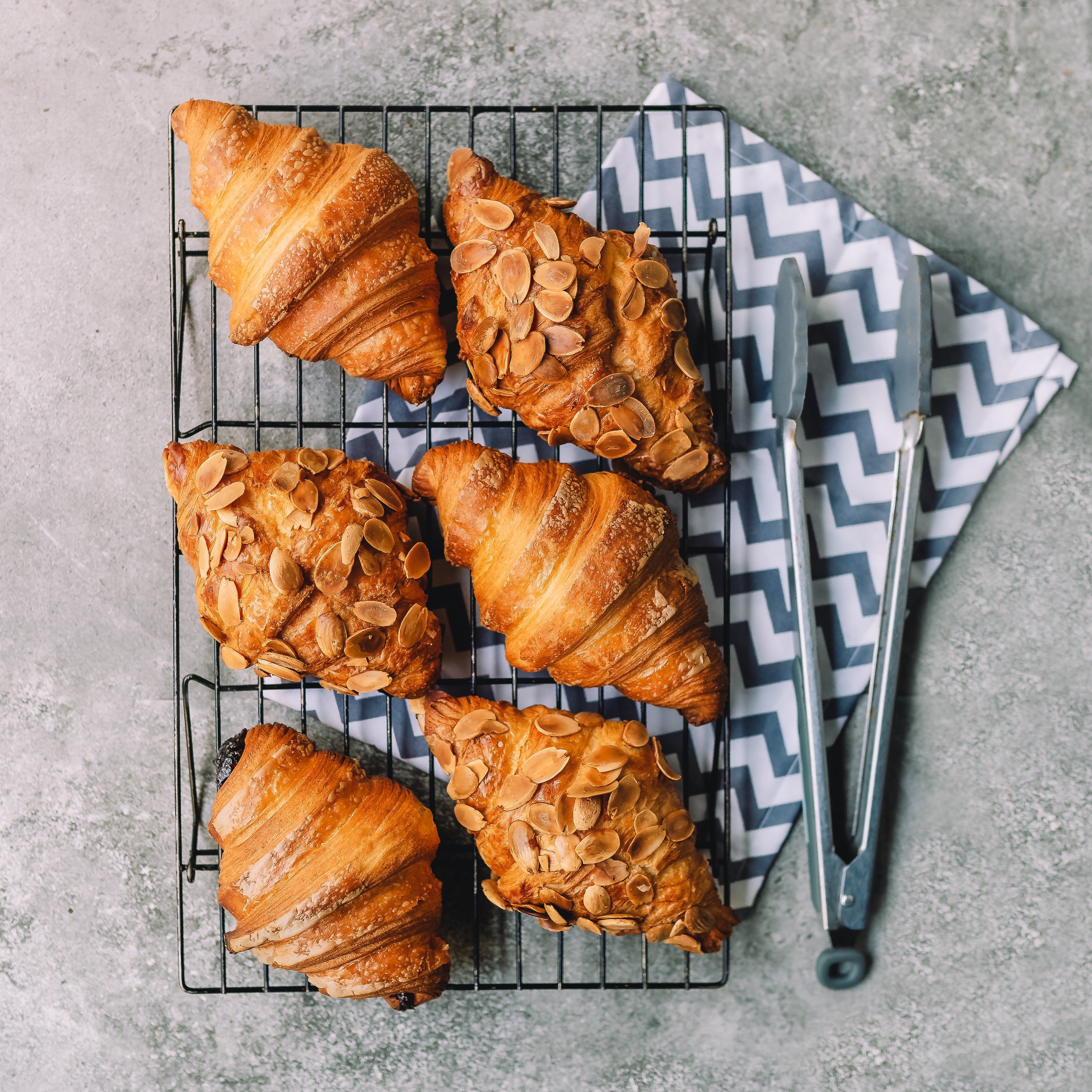 6 different croissants on a wire rack